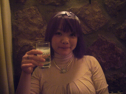 Miaomiao with a glass of Ouzo, at dinner in a restaurant in the Plaka district