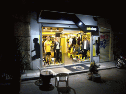 Shop of the soccer team AEK Athens, by night