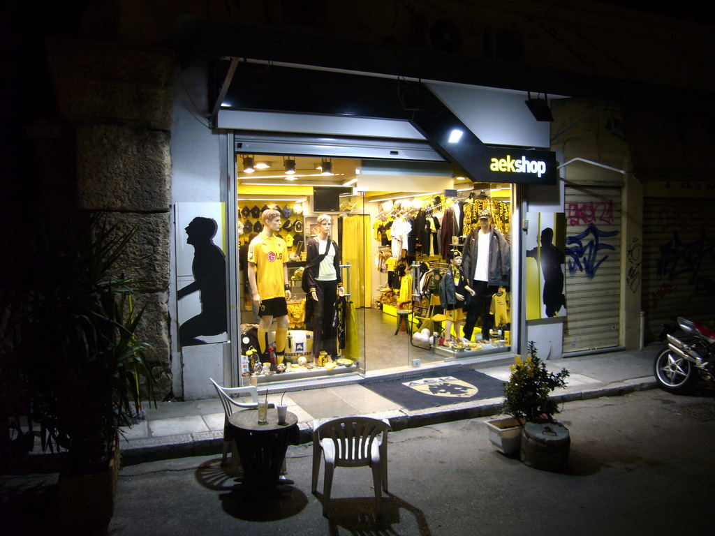 Shop of the soccer team AEK Athens, by night