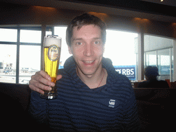 Tim with beer at Frankfurt Airport