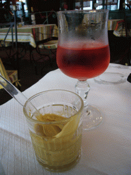 Drink and mustard in a restaurant in the city center