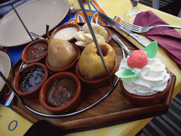 Toppings of crêpes in a restaurant in the city center