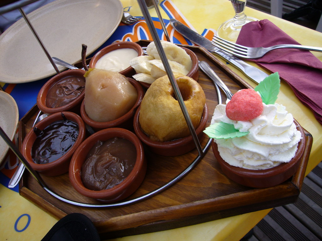 Toppings of crêpes in a restaurant in the city center