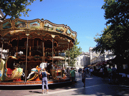 Carousel at the Place de l`Horloge square