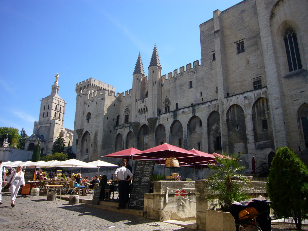 The Place du Palais square, the front of the Palais des Papes palace and the Avignon Cathedral