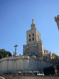 Tourist train, staircase and the Avignon Cathedral