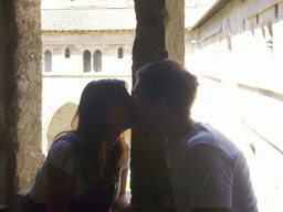 Tim and Miaomiao at a window with a view on the Cloister at the Palais des Papes palace