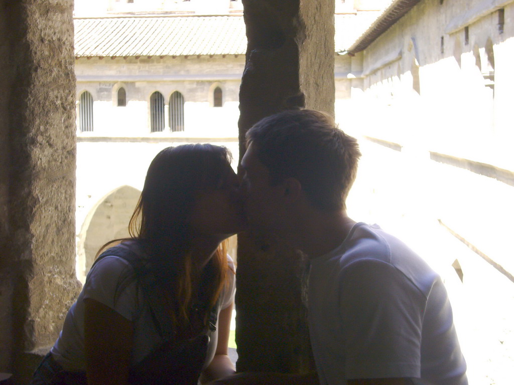 Tim and Miaomiao at a window with a view on the Cloister at the Palais des Papes palace