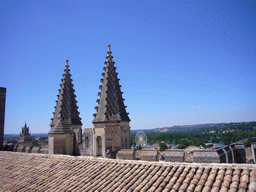 Roof and towers of the Palais des Papes palace, the Clock Tower of the City Hall and a ferris wheel, viewed from the roof of the Palais des Papes palace