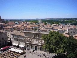 The south side of the Place du Palais square and a ferris wheel, viewed from the roof of the Palais des Papes palace