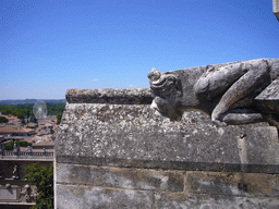 Wall with gargoyle and ferris wheel, viewed from the roof of the Palais des Papes palace