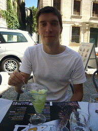 Tim eating icecream at our lunch restaurant in the city center