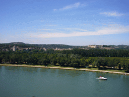 Boat in the Rhône river, the Tour Philippe le Bel tower and the Fort Saint-André, viewed from the Rocher des Doms gardens