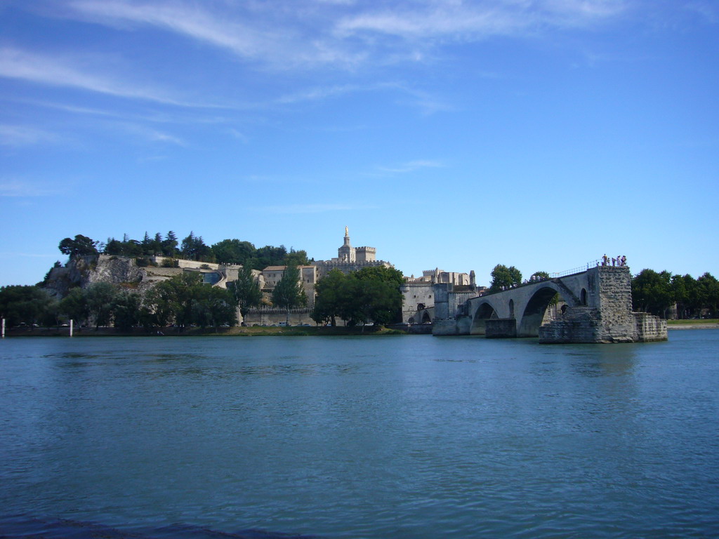 The Pont Saint-Bénezet bridge over the Rhône river, the Rocher des Doms gardens, the Avignon Cathedral and the Palais des Papes palace, viewed from the Chemin de la Traille street