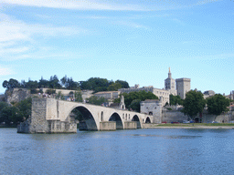 The Pont Saint-Bénezet bridge over the Rhône river, the Rocher des Doms gardens, the Avignon Cathedral and the Palais des Papes palace, viewed from the Chemin de la Traille street