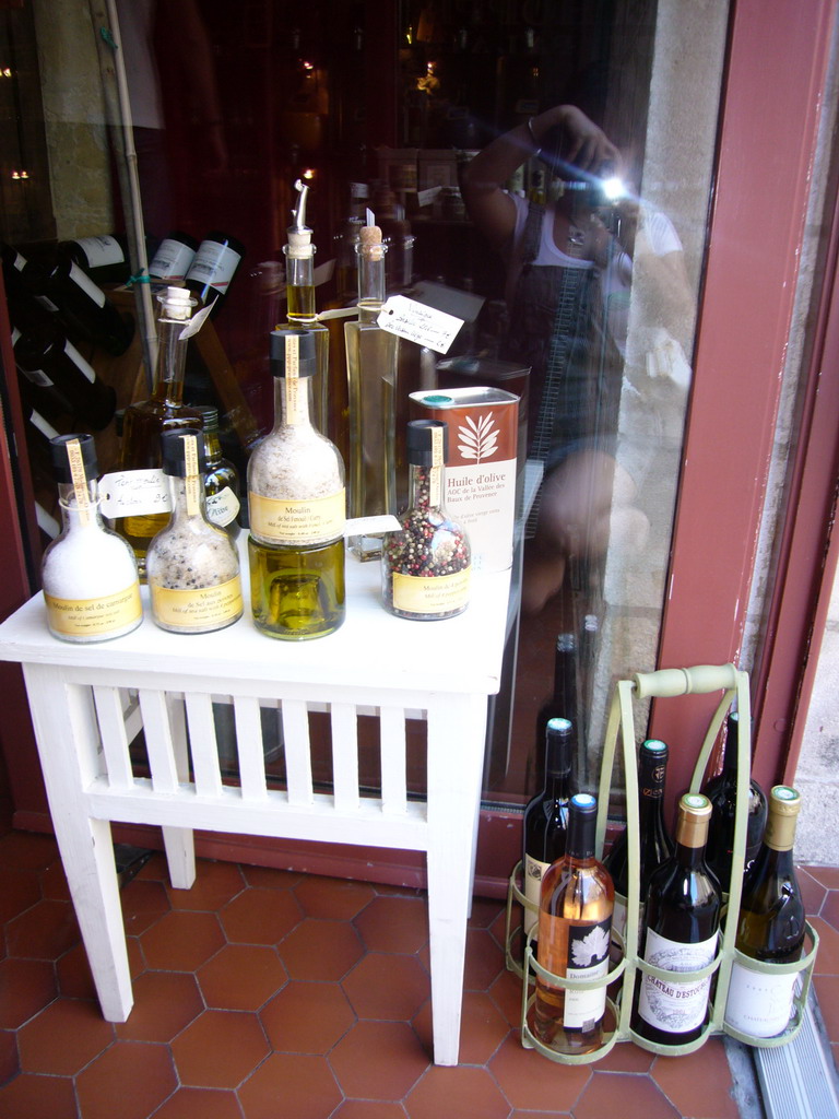 Bottles of salt, olive oil and wine in a shop in the city center