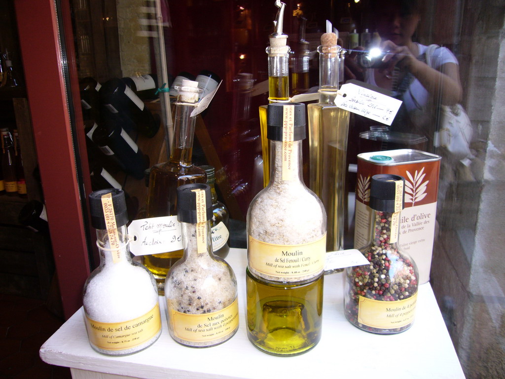 Bottles of salt and olive oil in a shop in the city center