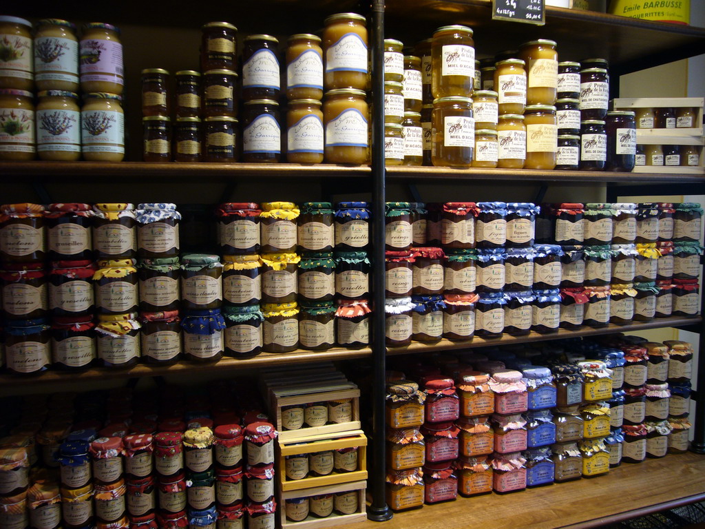 Bottles of honey and marmalade in a shop in the city center