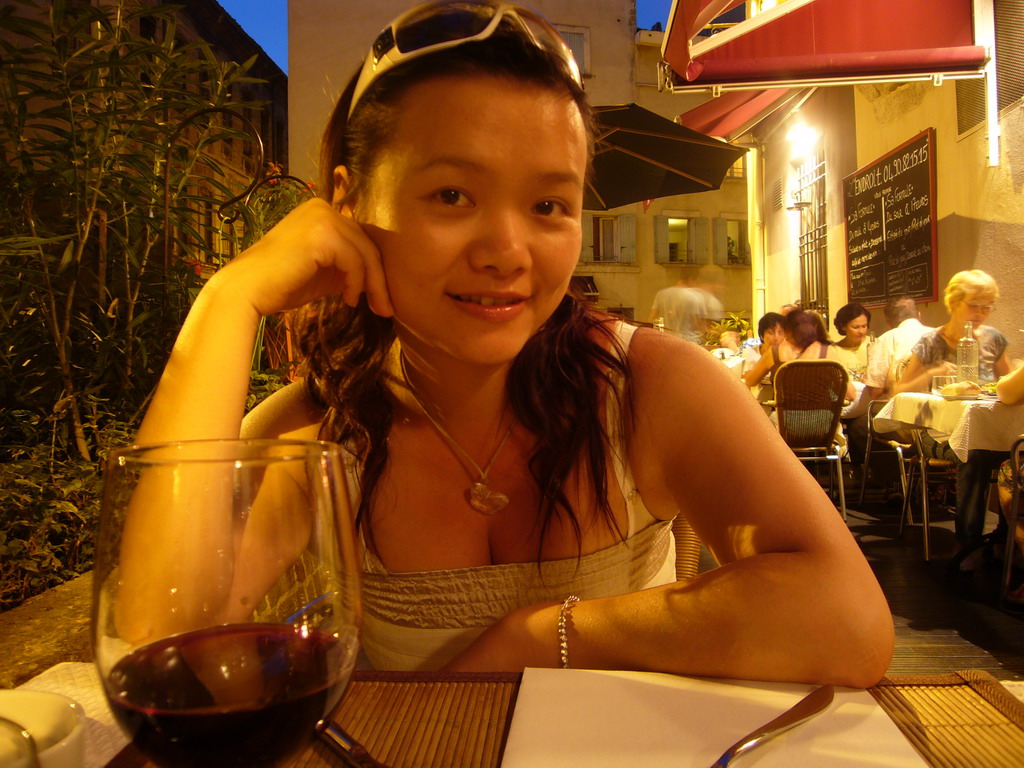 Miaomiao on the terrace of a restaurant in the city center