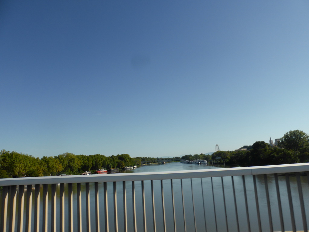 The Pont Édouard Daladier bridge over the Rhône river and a ferris wheel, viewed from our rental car on the Pont de l`Europe bridge