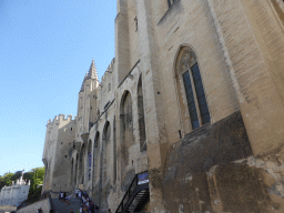 Right front side of the Palais des Papes palace at the Place du Palais square