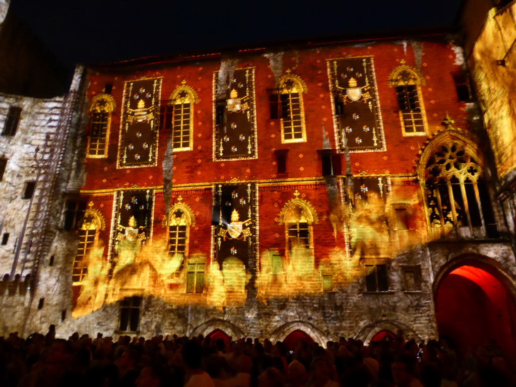 The southern wall at the Cour d`Honneur courtyard of the Palais des Papes palace, during the Les Luminessences d`Avignon light show, by night