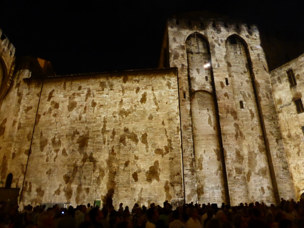 The eastern wall at the Cour d`Honneur courtyard of the Palais des Papes palace, during the Les Luminessences d`Avignon light show, by night