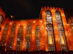 The eastern wall at the Cour d`Honneur courtyard of the Palais des Papes palace, during the Les Luminessences d`Avignon light show, by night