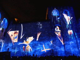 The eastern wall at the Cour d`Honneur courtyard of the Palais des Papes palace, during the Les Luminessences d`Avignon light show, by night