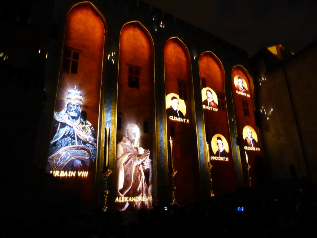 The northern wall at the Cour d`Honneur courtyard of the Palais des Papes palace, during the Les Luminessences d`Avignon light show, by night