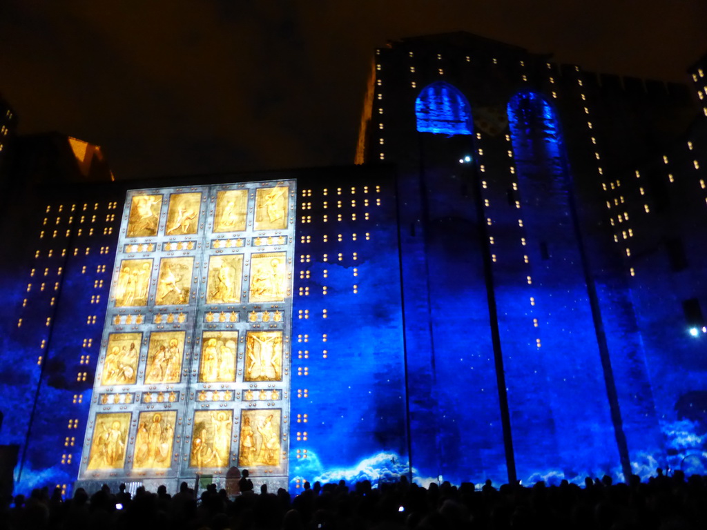 The eastern wall at the Cour d`Honneur courtyard of the Palais des Papes palace, during the Les Luminessences d`Avignon light show, by night