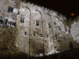 The northern wall at the Cour d`Honneur courtyard of the Palais des Papes palace, during the Les Luminessences d`Avignon light show, by night