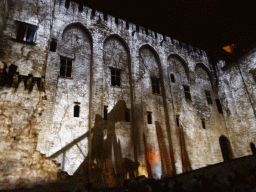 The northern wall at the Cour d`Honneur courtyard of the Palais des Papes palace, during the Les Luminessences d`Avignon light show, by night