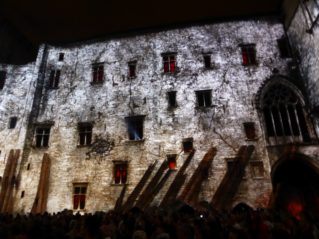 The southern wall at the Cour d`Honneur courtyard of the Palais des Papes palace, during the Les Luminessences d`Avignon light show, by night