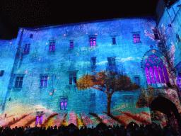 The southern wall at the Cour d`Honneur courtyard of the Palais des Papes palace, during the Les Luminessences d`Avignon light show, by night