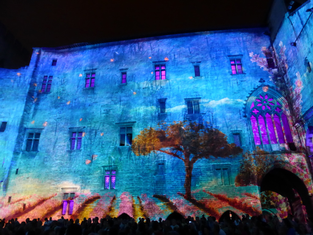 The southern wall at the Cour d`Honneur courtyard of the Palais des Papes palace, during the Les Luminessences d`Avignon light show, by night