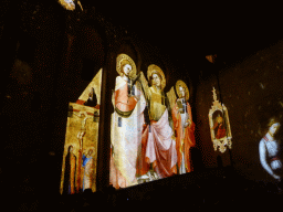 The northern wall at the Cour d`Honneur courtyard of the Palais des Papes palace, during the Les Luminessences d`Avignon light show, by night