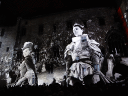 The southern wall at the Cour d`Honneur courtyard of the Palais des Papes palace, during the Les Luminessences d`Avignon light show, by night