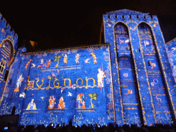 The eastern wall at the Cour d`Honneur courtyard of the Palais des Papes palace, during the Les Luminessences d`Avignon light show, by night