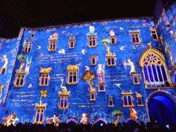 The southern wall at the Cour d`Honneur courtyard of the Palais des Papes palace, during the Les Luminessences d`Avignon light show, by night