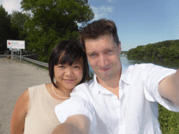 Tim and Miaomiao at a parking place next to the Route Touristique du Dr. Pons road, with a view on the Pont Saint-Bénézet bridge over the Rhône river