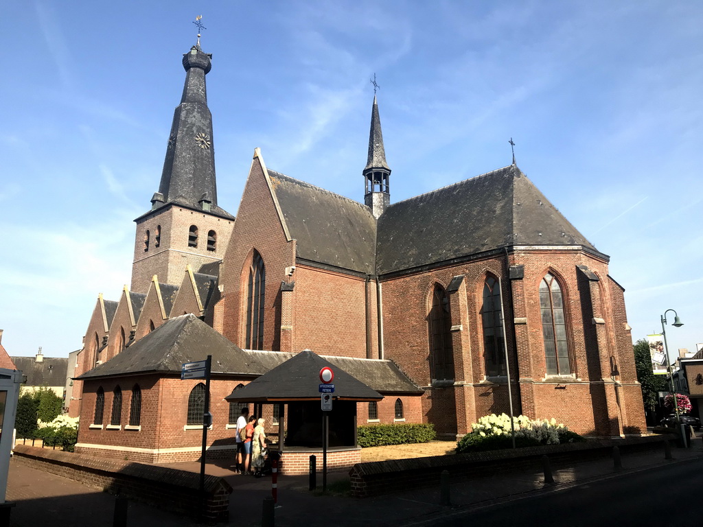 Southeast side of the St. Remigius Church with an information stand, viewed from the Singel street