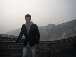 Tim on the Badaling Great Wall near the Eighth Tower of the North Side, with a view on the Seventh and Sixth Tower