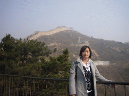 Miaomiao, the Eighth Tower of the North Side of the Badaling Great Wall and the entrance to the cable lift, viewed from a path near the Sixth Tower