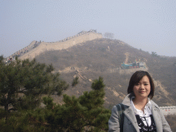 Miaomiao, the Eighth Tower of the North Side of the Badaling Great Wall and the entrance to the cable lift, viewed from a path near the Sixth Tower