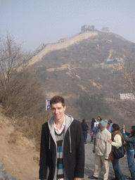 Tim, the Eighth Tower of the North Side of the Badaling Great Wall and the entrance to the cable lift, viewed from a path near the Sixth Tower