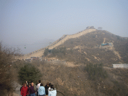 The Eighth Tower of the North Side of the Badaling Great Wall and the entrance to the cable lift, viewed from a path near the Sixth Tower