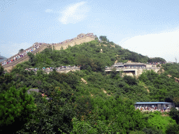 The Eighth Tower of the North Side of the Badaling Great Wall and the entrance to the cable lift, viewed from a path near the Sixth Tower