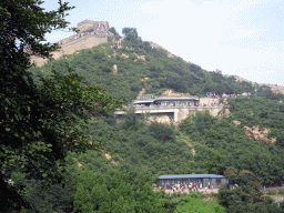 The Eighth Tower of the North Side of the Badaling Great Wall and the entrance to the cable lift, viewed from a path near the Sixth Tower