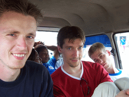 Tim and his friends in the car from Douala